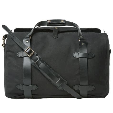 MEDIUM DUFFLE BAG WITH WEB|medium rugged twill duffle bag.